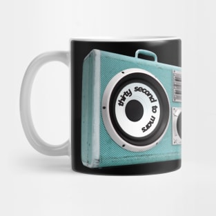 a radio with 30 second to mars sticker Mug